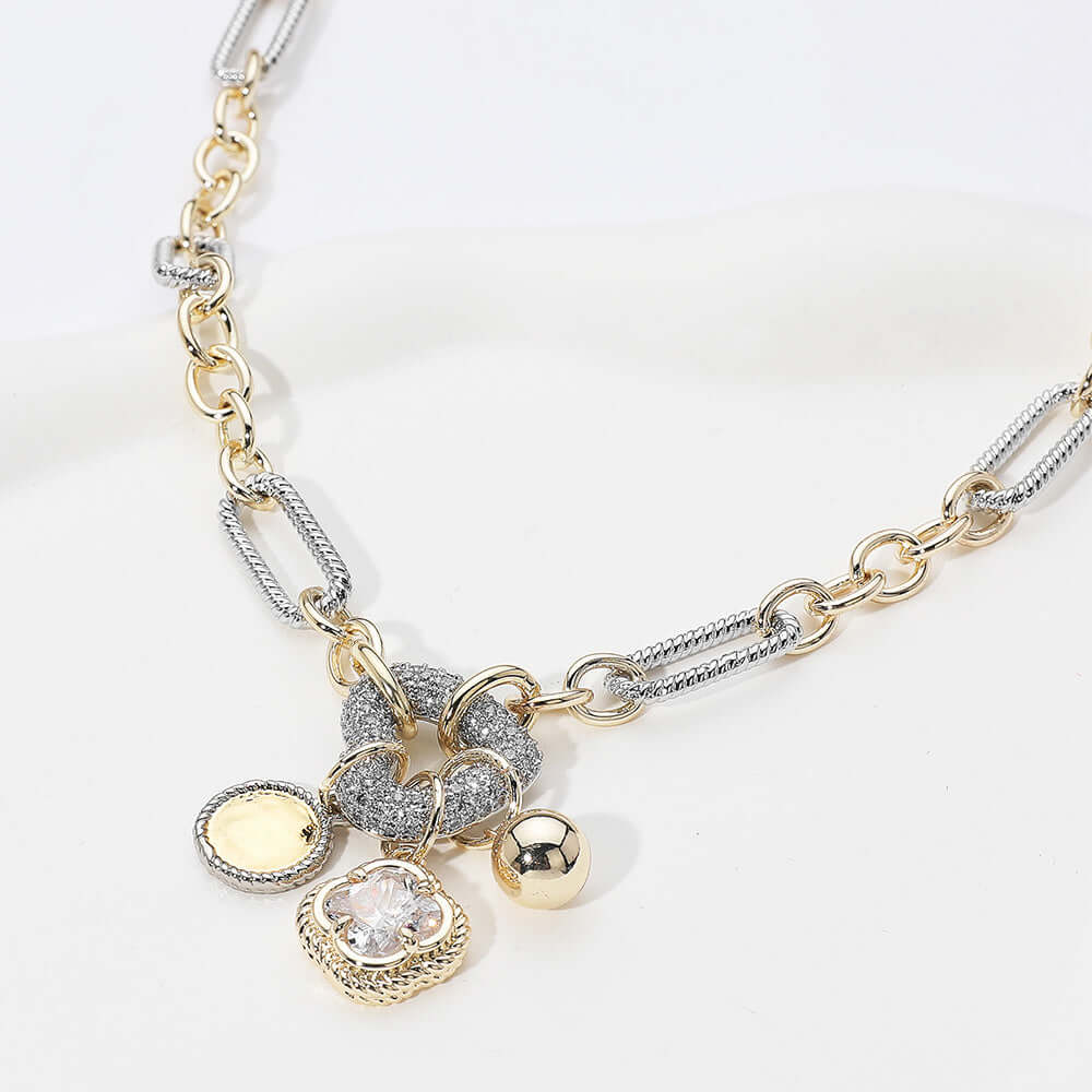 Two Tone 14K Gold Plated CZ Paved Heart Ring Disc Ball Quatrefoil Cluster Charm Pendant Necklace M H W ACCESSORIES LLC Two Tone 14K Gold Plated CZ Paved Heart Ring Disc Ball Quatrefoil Cluster Charm Pendant Necklace