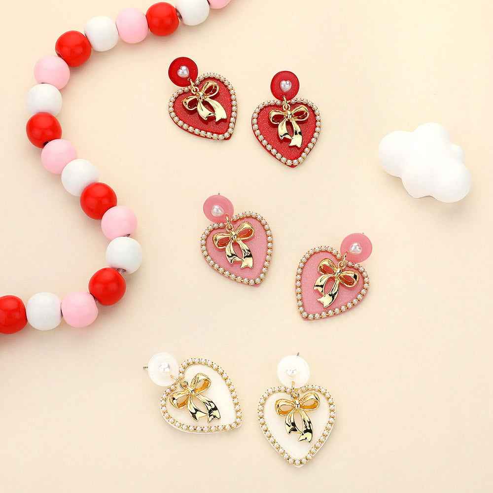 Red Metal Bow Centered Pearl Rim Glittered Resin Heart Dangle Earrings