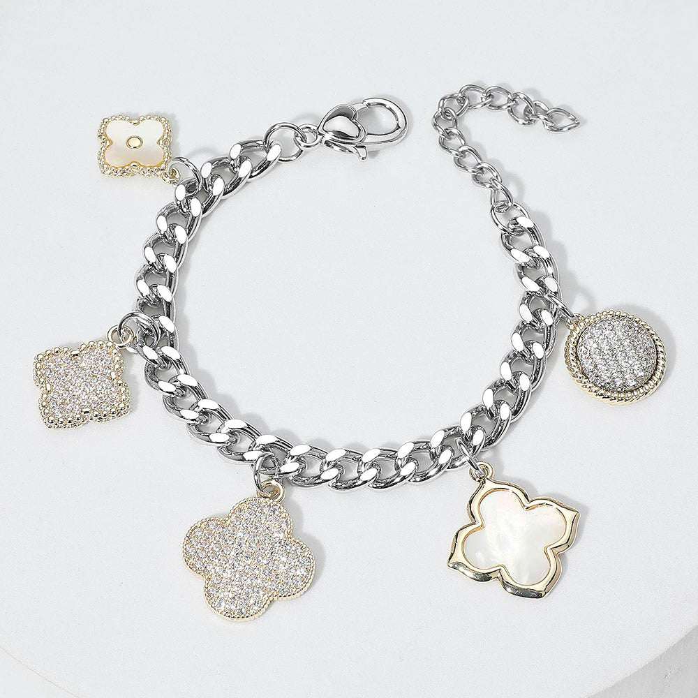 14K Gold Plated CZ Stone Paved Mother of Pearl Quatrefoil Charm Station Bracelet M H W ACCESSORIES LLC 14K Gold Plated CZ Stone Paved Mother of Pearl Quatrefoil Charm Station Bracelet