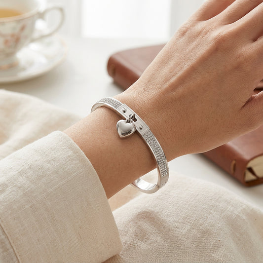 Stainless Steel Heart Charm Accent CZ Stone Paved Hinged Bangle Bracelet M H W ACCESSORIES LLC Stainless Steel Heart Charm Accent CZ Stone Paved Hinged Bangle Bracelet