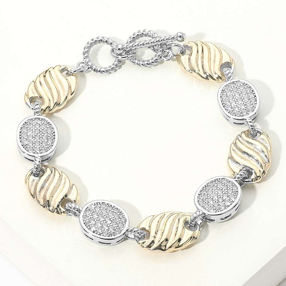 Two Tone 14K Gold Plated CZ Pave Alternating Round Disc and Oval Link Statement Bracelet M H W ACCESSORIES LLC Two Tone 14K Gold Plated CZ Pave Alternating Round Disc and Oval Link Statement Bracelet