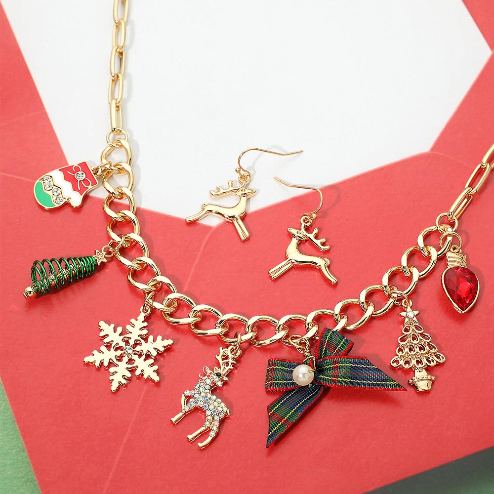 Christmas Tree Bow Reindeer Snowflake Light Bulb Charm Station Necklace M H W ACCESSORIES LLC Christmas Tree Bow Reindeer Snowflake Light Bulb Charm Station Necklace