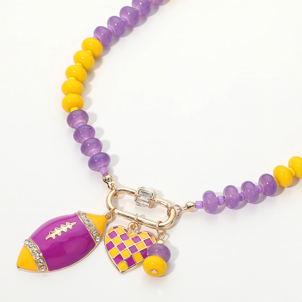 Purple & Yellow Gameday Football Heart Charm  Pendant Beaded Necklace M H W ACCESSORIES LLC Purple & Yellow Gameday Football Heart Charm  Pendant Beaded Necklace