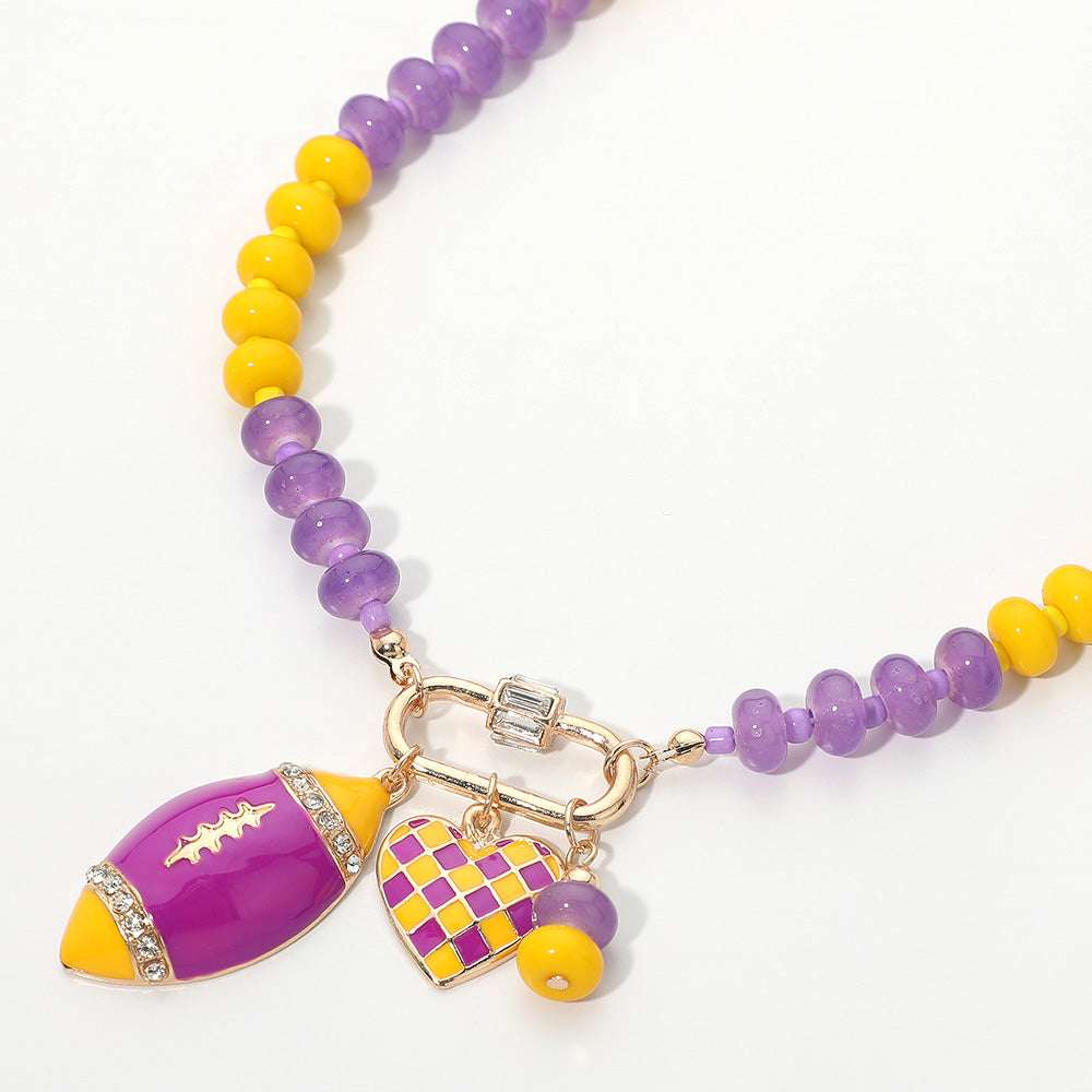 Purple & Yellow Gameday Football Heart Charm  Pendant Beaded Necklace M H W ACCESSORIES LLC Purple & Yellow Gameday Football Heart Charm  Pendant Beaded Necklace