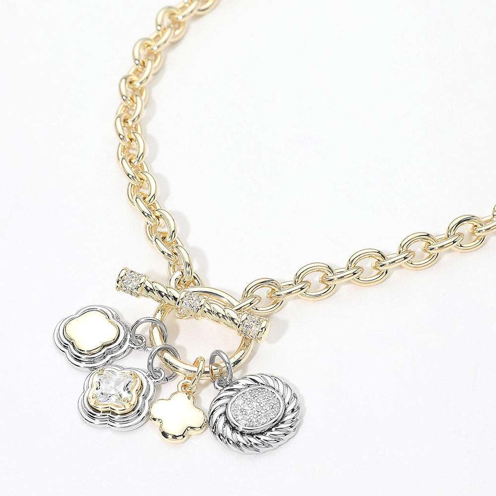 14K Gold Plated Two Tone CZ Quatrefoil Oval Multi Charm Toggle Necklace M H W ACCESSORIES LLC 14K Gold Plated Two Tone CZ Quatrefoil Oval Multi Charm Toggle Necklace
