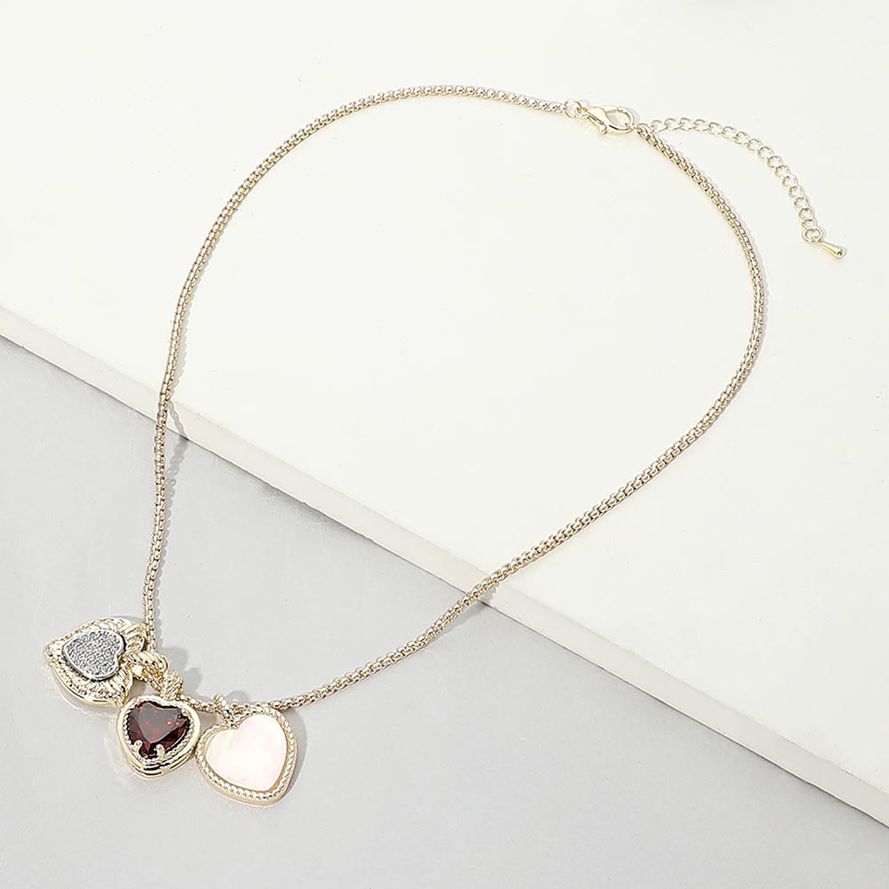 14K Gold Plated Triple CZ Mother of Pearl Heart Charm Pendant Necklace M H W ACCESSORIES LLC 14K Gold Plated Triple CZ Mother of Pearl Heart Charm Pendant Necklace