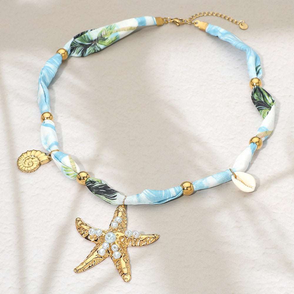 Stainless Steel Coastal Starfish Shell Charm Accent Fabric Scarf Necklace M H W ACCESSORIES LLC Stainless Steel Coastal Starfish Shell Charm Accent Fabric Scarf Necklace