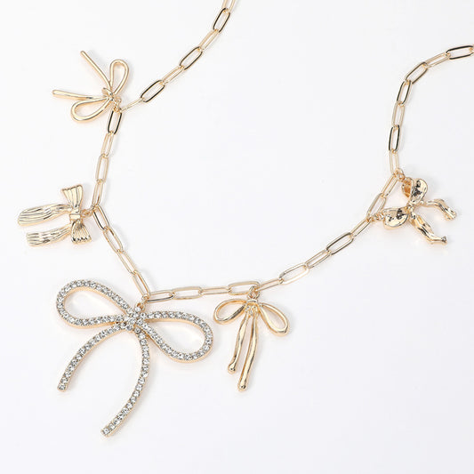 Gold Paved Bow Metal Bow Charm Station Paperclip Chain Necklace