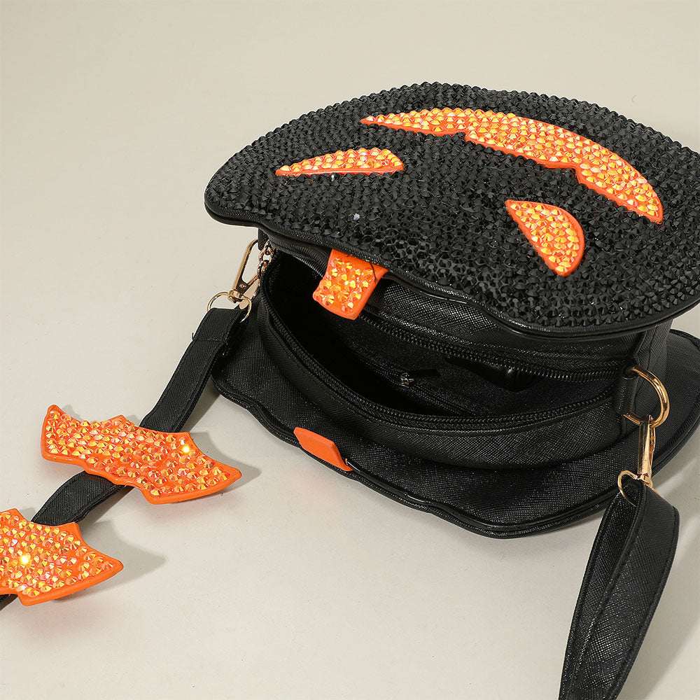 Bling Studded Halloween Pumpkin Black Face Bat Strap Crossbody Bag M H W ACCESSORIES LLC Bling Studded Halloween Pumpkin Black Face Bat Strap Crossbody Bag