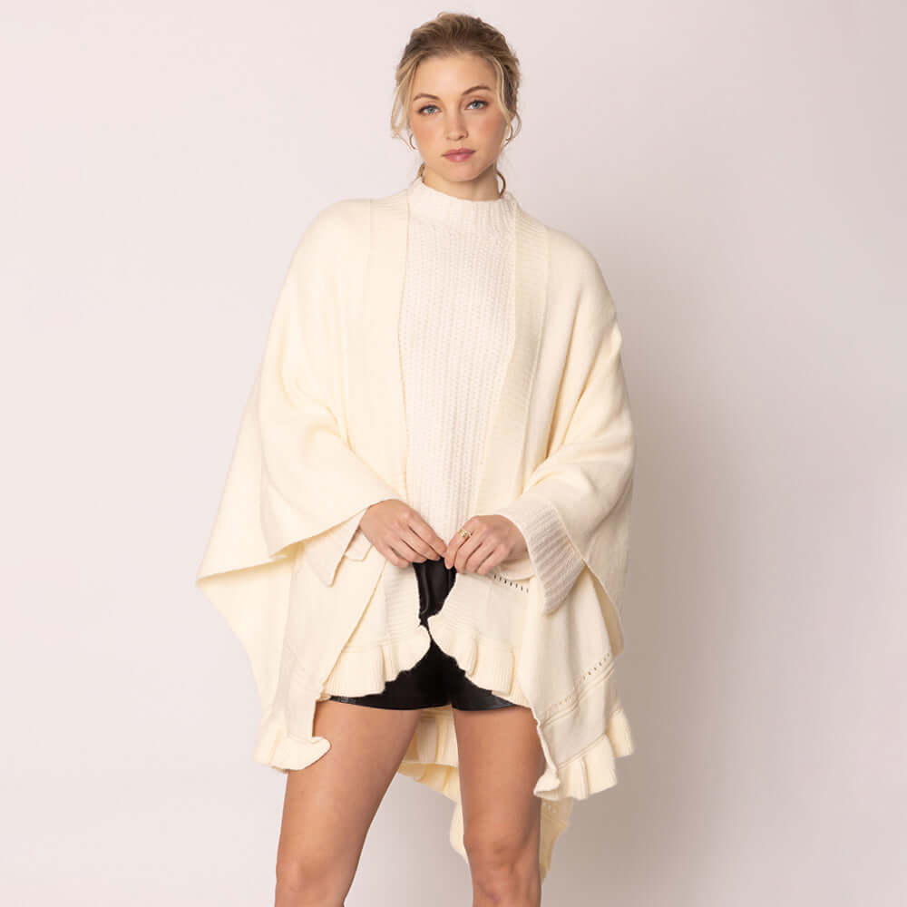 Ivory Ruffle Hem Knit Ruana - M H W ACCESSORIES LLC