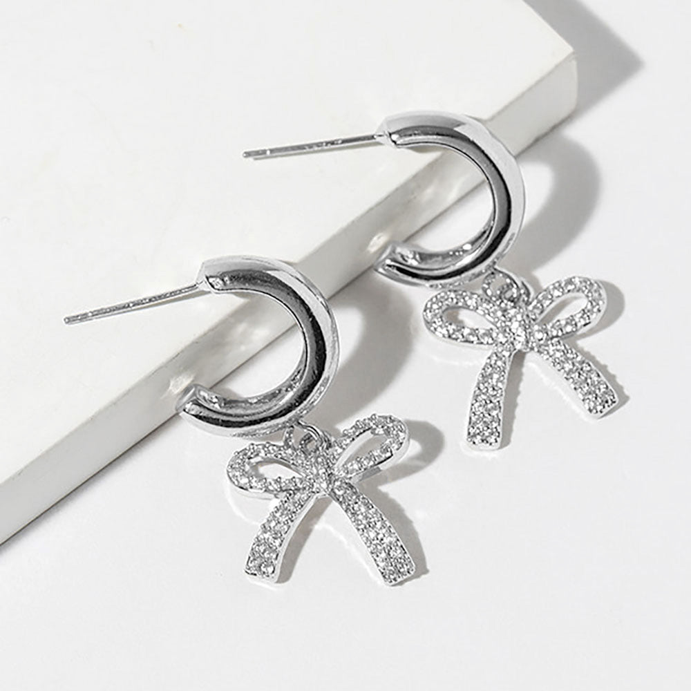 White Gold Dipped CZ Stone Paved Bow Drop Dangle Mini Hoop Earrings