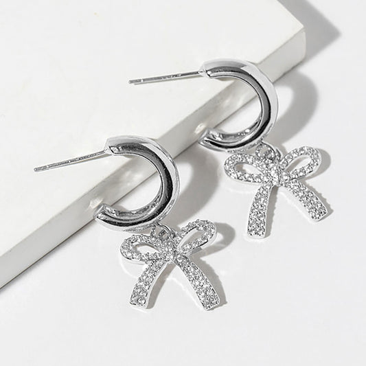 White Gold Dipped CZ Stone Paved Bow Drop Dangle Mini Hoop Earrings
