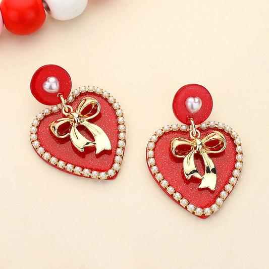 Red Metal Bow Centered Pearl Rim Glittered Resin Heart Dangle Earrings - M H W ACCESSORIES LLC