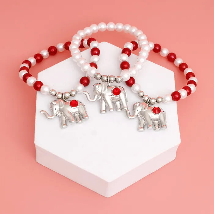 Red & White Stone Paved Elephant Stretch Pearl Strand Bracelet